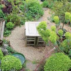 Weathered teak garden set retailed through Heals