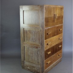 Heals 1930's tallboy with two door cupboard above four drawers