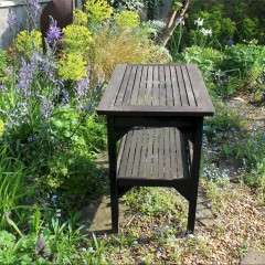 Teak garden table by Hughes Bolckow