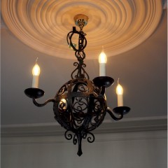 Arts and crafts iron hanging four branch ceiling lamp .c1910