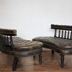 Unusual pair of Victorian leather buttoned back settees