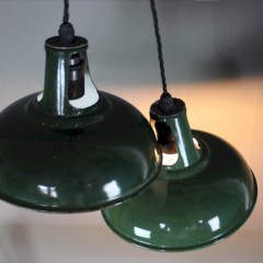 Pair of small green enamelled factory lights