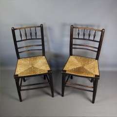 Sussex chairs near pair by Morris & Co