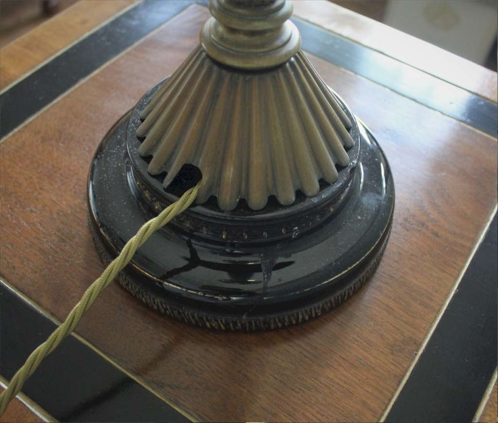 Victorian brass and black ceramic table lamp