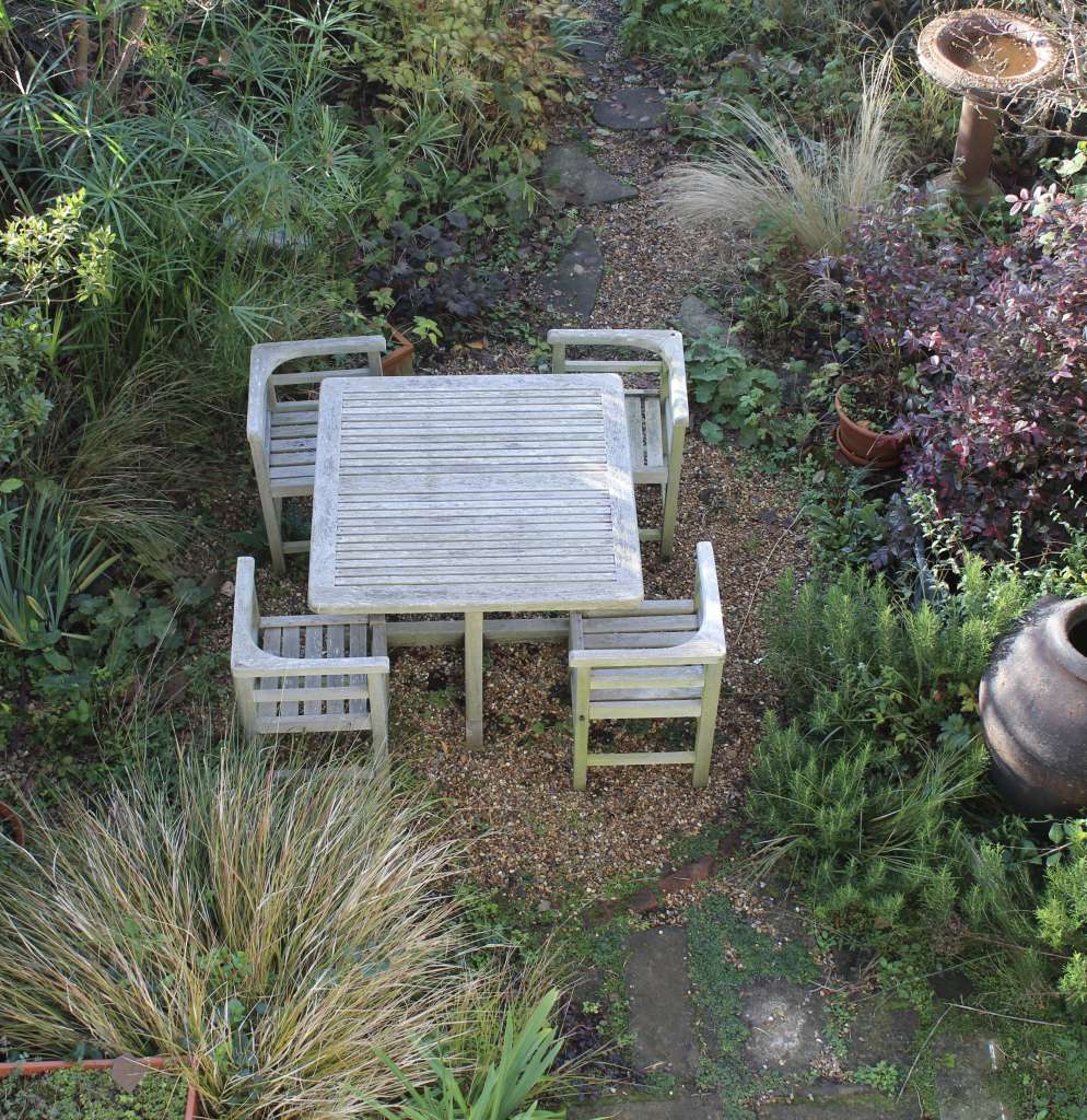 Weathered teak garden set retailed through Heals