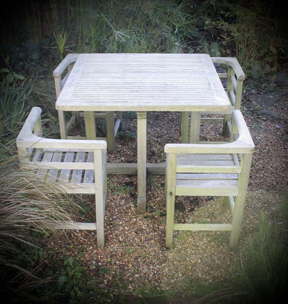 Weathered teak garden set retailed through Heals