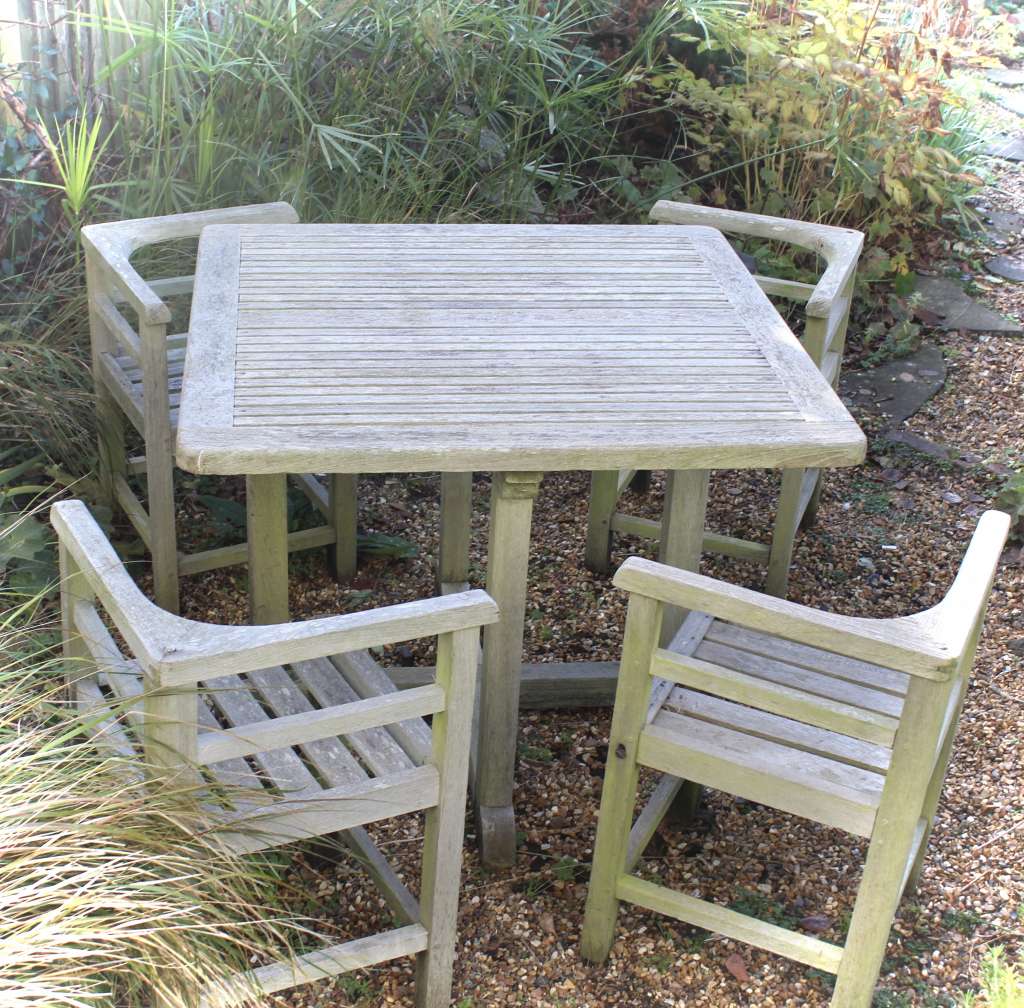 Weathered teak garden set retailed through Heals