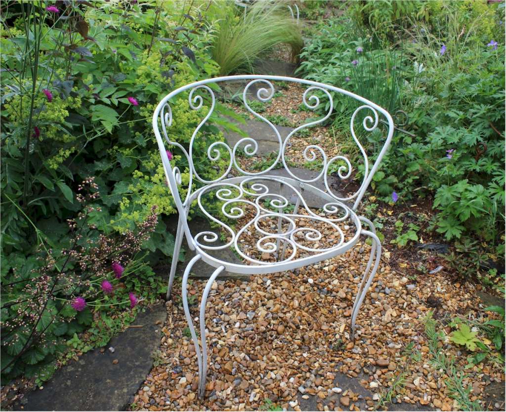 Pair of decorative metal garden chairs